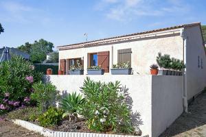 Maisons de vacances Magnifique maison avec une superbe terrasse vue mer - Albitreccia - Welkeys : photos des chambres