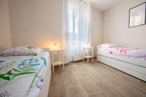 Appartements LOC TROTTEUR LE CACAO - Balneo, Gare Lourdes : photos des chambres