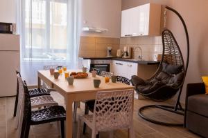 Appartements LOC TROTTEUR LE CACAO - Balneo, Gare Lourdes : photos des chambres