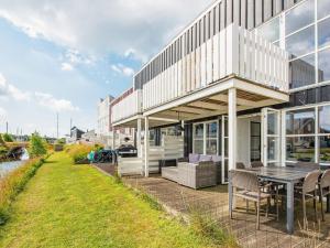 6 person holiday home on a holiday park in Ebeltoft