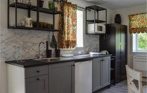 Nice Apartment In Malmköping With Sauna