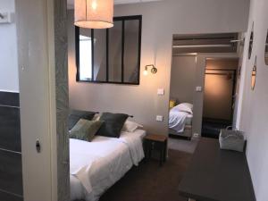 Hotels Cit'Hotel Les Alizes : photos des chambres