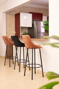 Distinct & Decent 2 BDR Apt Steps From Nightlife and Airport