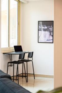 Distinct & Decent 2 BDR Apt Steps From Nightlife and Airport