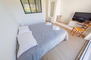 B&B / Chambres d'hotes Le 74 : photos des chambres