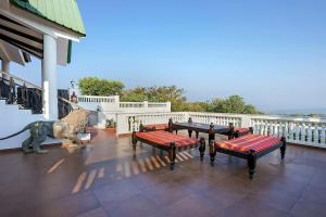Ananda Villa by StayVista - A serene escape with Mountain-view, Heritage interiors, Swimming pool & Lush lawn