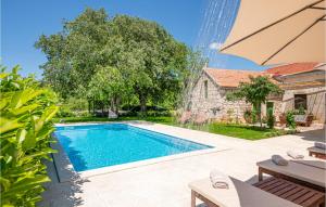 Nice home in Lovrec with Outdoor swimming pool WiFi and 5 Bedrooms