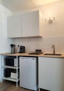 Studio fonctionnel au calme avec garage individuel et balcon