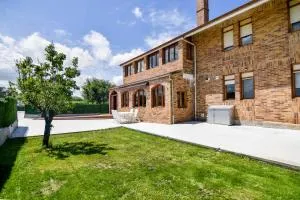 Cómoda y amplia planta baja con jardín cerca de todo - Hoznayo