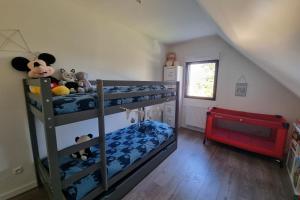 Maisons de vacances Jolie maison avec terrasse et jardin a Amfreville : photos des chambres