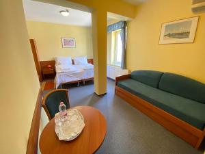 Quadruple Room room in Tisza Alfa Hotel
