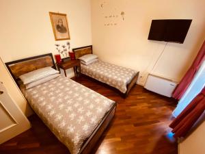 Camera Doppia con Letti Singoli con Bagno Privato Esterno