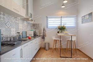 Appartements Gite Villa Elisaia location de meubles de tourisme chez l'habitant : photos des chambres