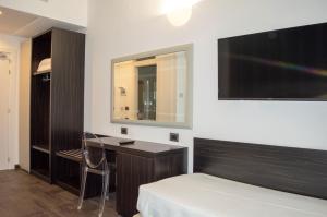 Elegance Quadruple Room Dependance room in Hotel Cerere