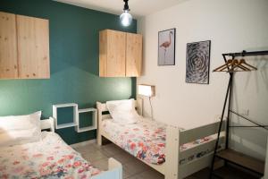 Appartements ColorPop - Netflix Wifi Tout equipe - Appart Pezenas Centre : photos des chambres