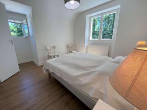 Maisons de vacances Grande maison familiale a 800m de la plage de Kermor avec jardin - FR-1-481-122 : photos des chambres