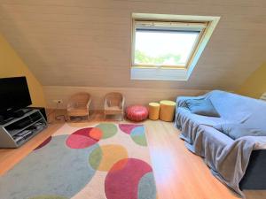 Maisons de vacances Grande maison familiale a 800m de la plage de Kermor avec jardin - FR-1-481-122 : photos des chambres