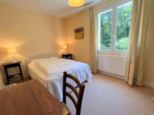 Maisons de vacances Grande maison familiale a 800m de la plage de Kermor avec jardin - FR-1-481-122 : photos des chambres