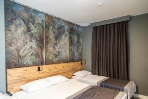 Double Room with Balcony (3 Adults) room in Pure Blanche Hotel