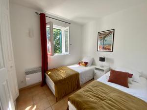 Villa vue mer donnant sur le Golfe de St Tropez, 2 chambres, 6 pers, piscine commune