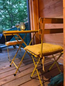 Chalets Charmante Cabane dans les arbres avec jacuzzi et sauna : photos des chambres