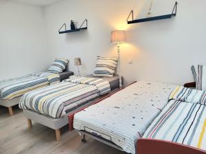 Appartements Superbe appartement avec parking prive : photos des chambres