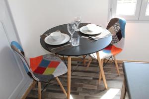 Appartements LES COTTAGES DU PRYTANEE : photos des chambres