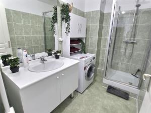 Appartements Le CONTI Proche Roissy - Asterix- Gare : photos des chambres