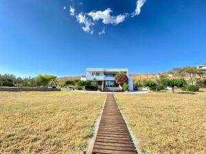 Beach housein a beautiful bay
