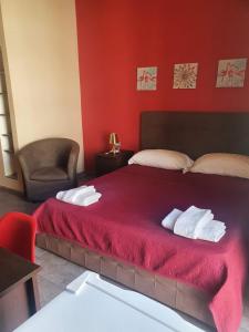 Quadruple Room with Balcony room in EmyJo Central B&B