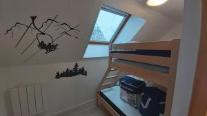 Appartements La foret des Marmottes : photos des chambres