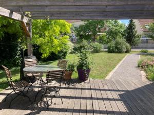 Appartements Gites au jardin : photos des chambres