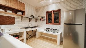 Ayu Sari Guesthouse Ubud by Mahaputra