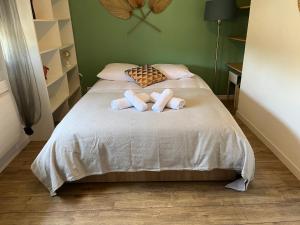 Appartements La Palmeraie YourHostHelper : photos des chambres