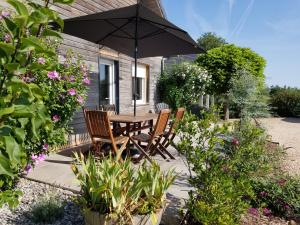 Maisons de vacances La Tuillere : maison en bois avec vue et piscine : photos des chambres