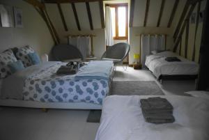 B&B / Chambres d'hotes Odiel & Gabrielle : photos des chambres