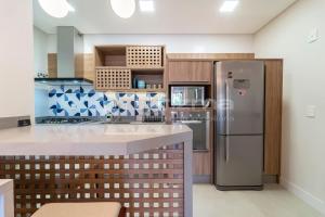 304 Bl 02 - WaldGarten Bombinhas - 50m do Mar e Frente Avenida - Condomínio de Alto Padrão - Piscina - Academia - Salão de jogos