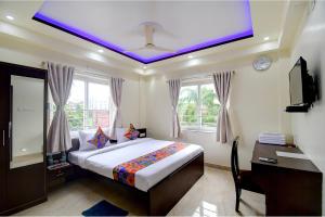 FabHotel Anchorage Inn - Nr Axis Mall