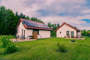 Między ciszą a ciszą - domki całoroczne