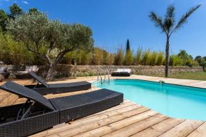 Maisons de vacances Smashing little house with AC and pool - Dodo et Tartine : photos des chambres