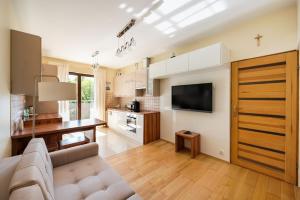 Green District 2BR AirConditioned P by BookingHost