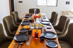 SaffronStays Turquoise Maison - 3BR pool villa with jacuzzi, bonfire & fruit garden near Lake Kalote, Karjat