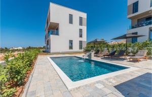 Nice apartment in Sveti Filip i Jakov with WiFi Heated swimming pool and 2 Bedrooms