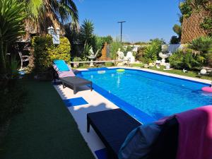 Maisons de vacances SUITE-Junior -Villa HELENE - Montpellier Sud - aeroport- PISCINE Privee-2mn des plages : photos des chambres