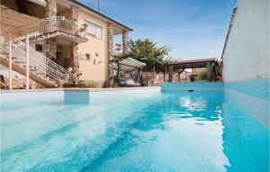Amazing Apartment In Valbandon With Outdoor Swimming Pool, Wifi And 1 Bedrooms