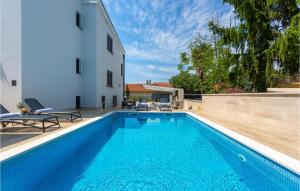 Stunning Apartment In Malinska With Outdoor Swimming Pool, Wifi And Swimming Pool