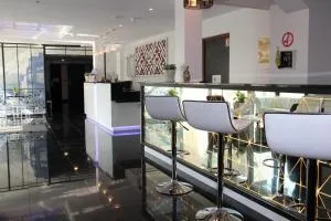 圣昆汀伊芙林卡吕德酒店 - 蒙蒂尼 - 米隆拉沙佩勒