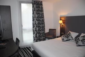 Hotels Kyriad Saint Quentin en Yvelines - Montigny : photos des chambres