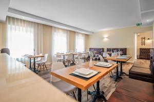 TOSCANINA Garni Hotel