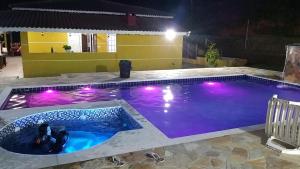 Chácara com Wi-Fi, piscina, playground em MongaguáSP